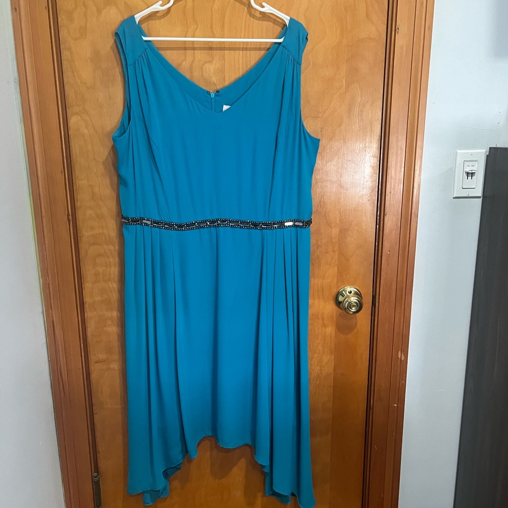 Woman’s size 16 Pretty teal colored gown with beaded waist